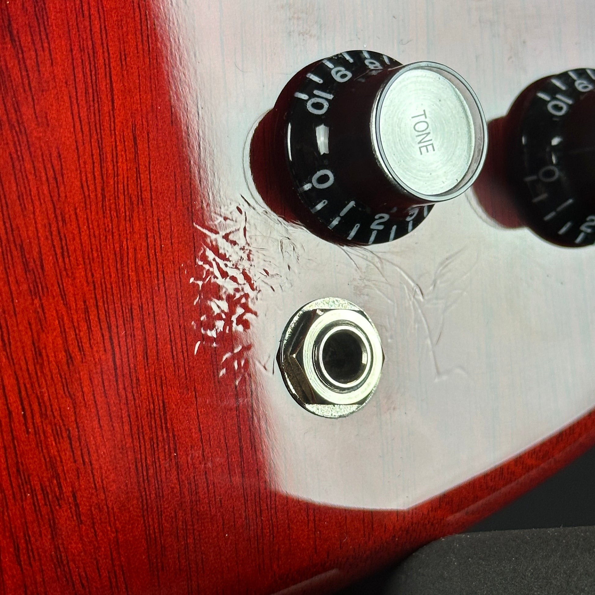 Scratches near controls of Used Gibson SG Standard Cherry.