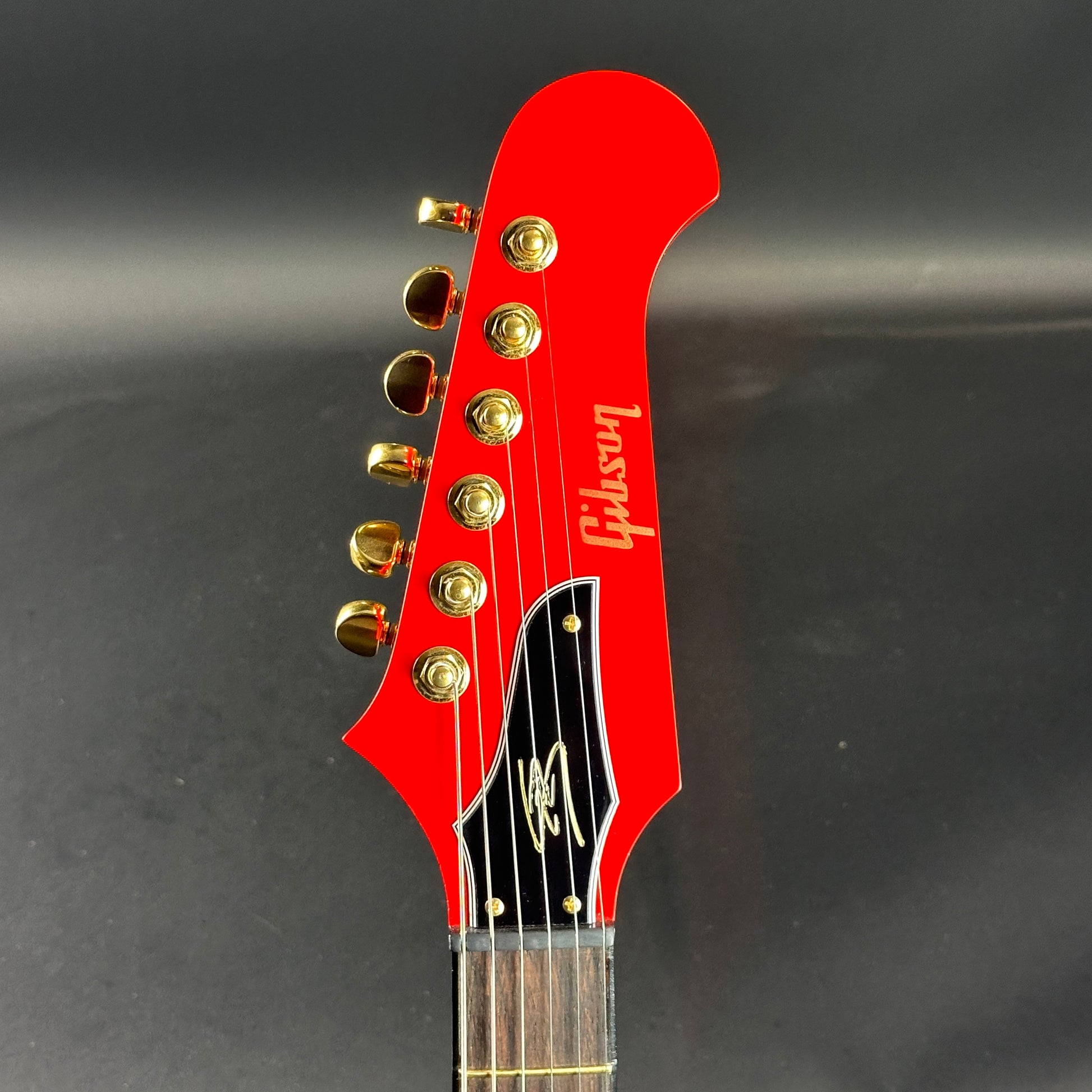 Front of headstock of Used Gibson Lzzy Hale Signature Explorerbird Cardinal Red.