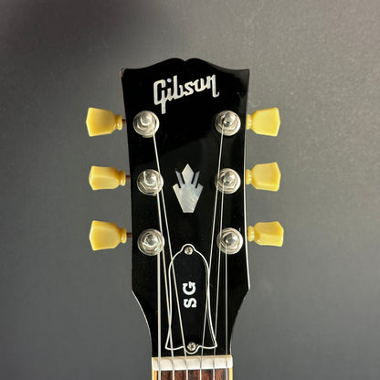 Front of headstock of Used 2009 Gibson SG Standard Cherry.