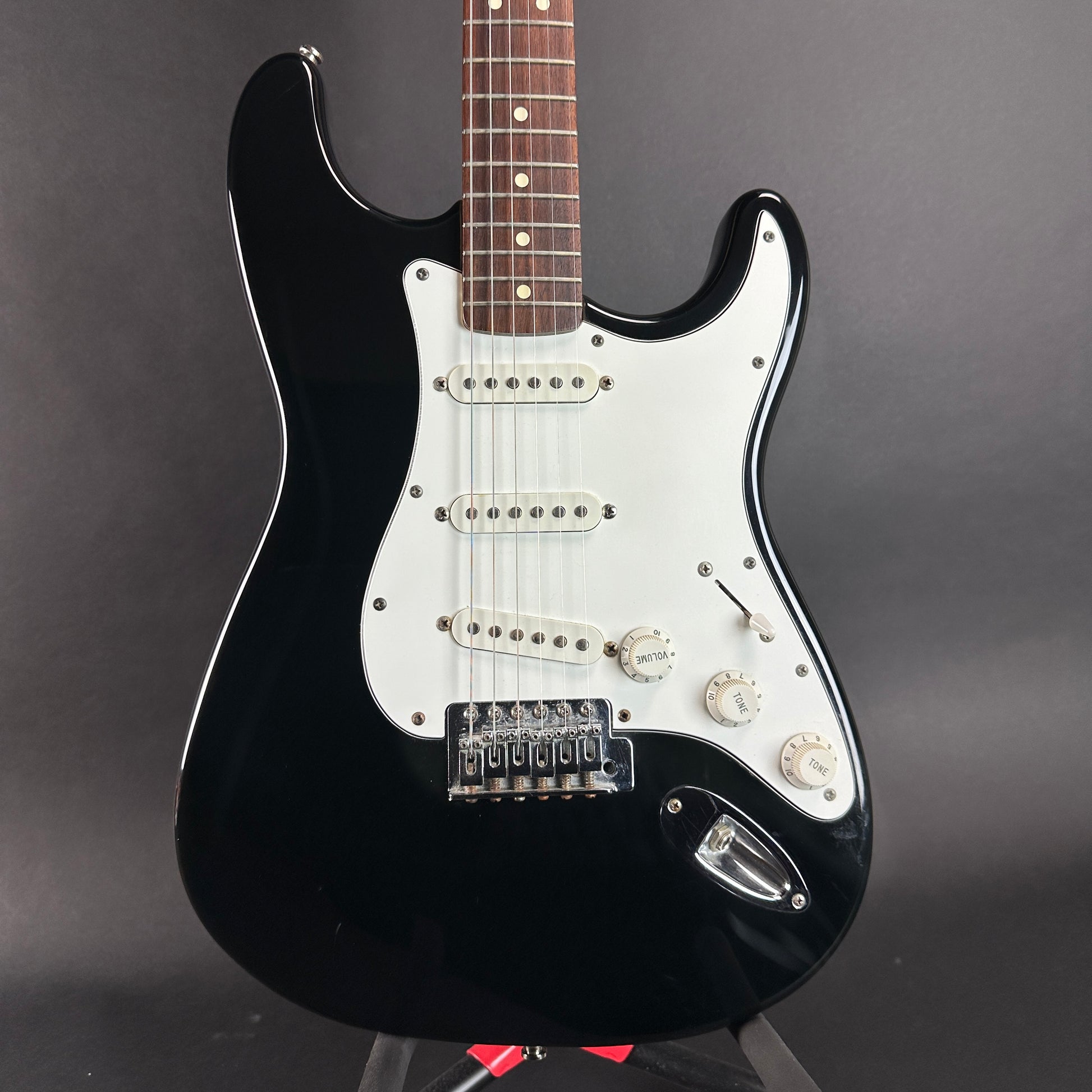 Front of body of Used Fender MIM Standard Strat Black.