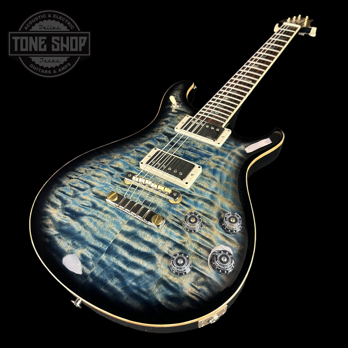 Front angle of PRS Wood Library McCarty 594 10-top Quilt Faded Whale Blue Smokeburst.