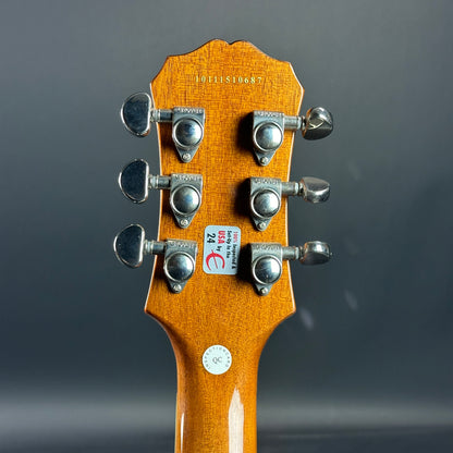 Back of headstock of Used Epiphone Les Paul Standard Honeyburst.