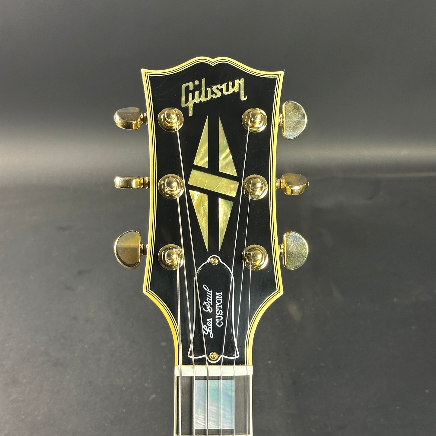 Front of headstock of Used Gibson Custom Shop Les Paul Custom Antique Silverburst Murphy Lab Light Aged.