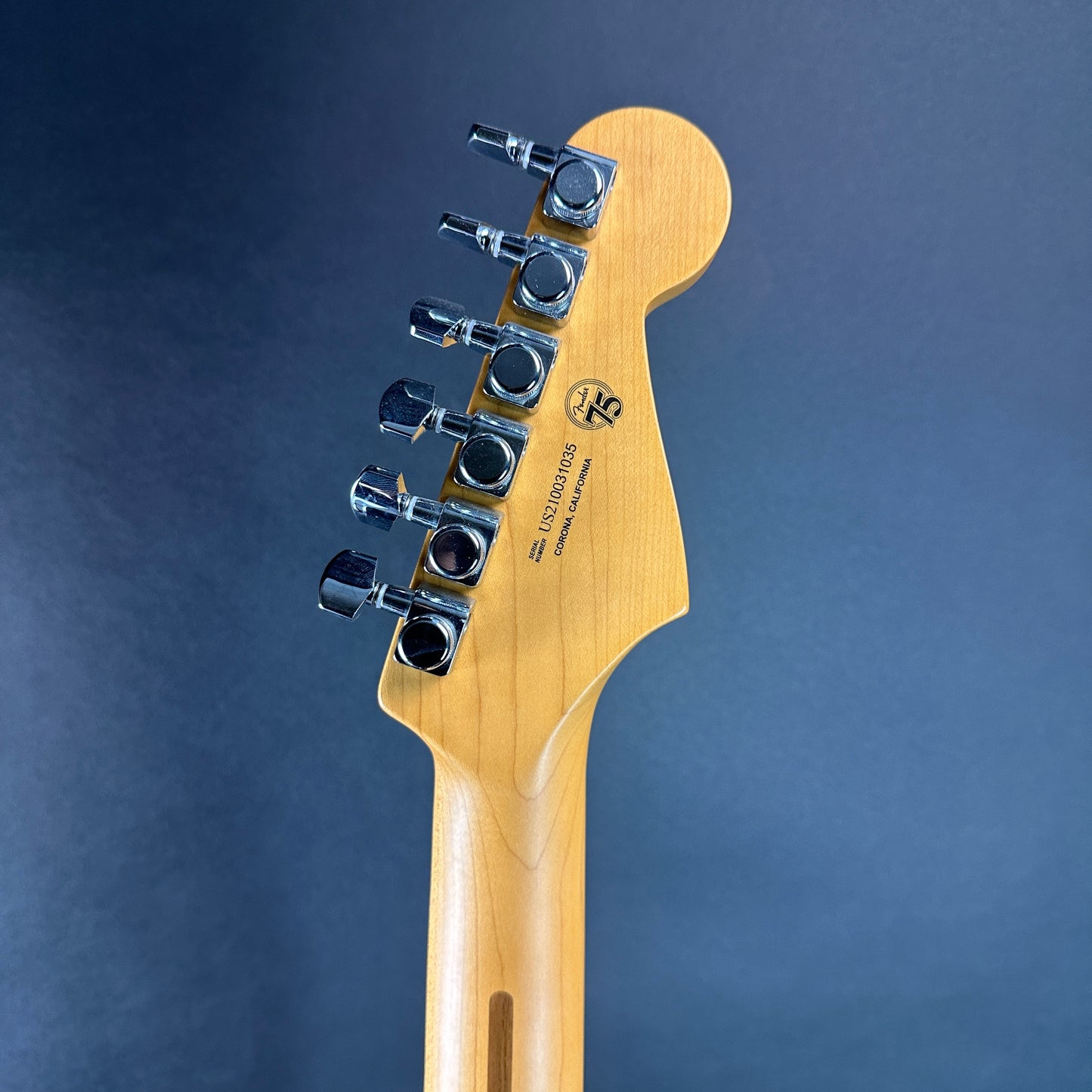 Back of headstock of Used Fender American Ultra Stratocaster Left Hand Arctic Pearl.