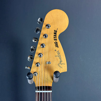 Front of headstock of Used Fender Kurt Cobain Jagstang RW Sonic Blue.