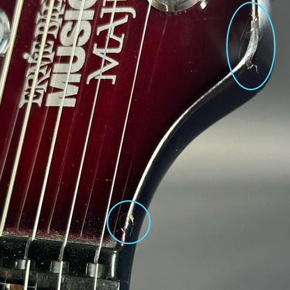 Small dents on headstock of Used Ernie Ball Petrucci Monarch Majesty Red.