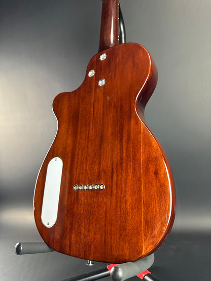 Back angle of Used Harmony Juno Transparent Brown Flame Maple.