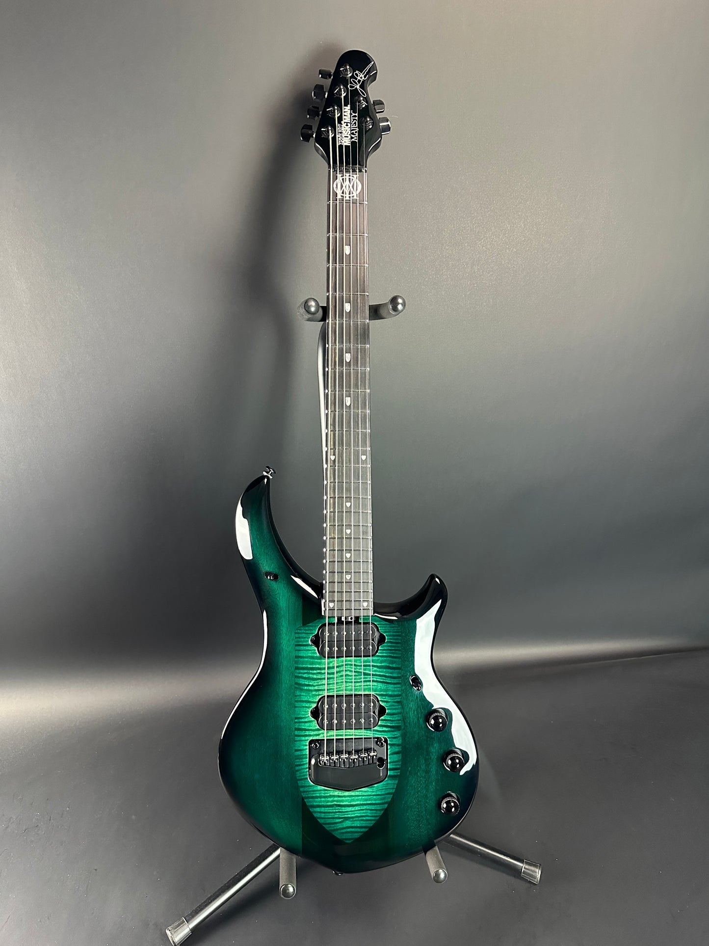 Full front of Used Ernie Ball MusicMan Majesty 6 John Petrucci Gravity Green.