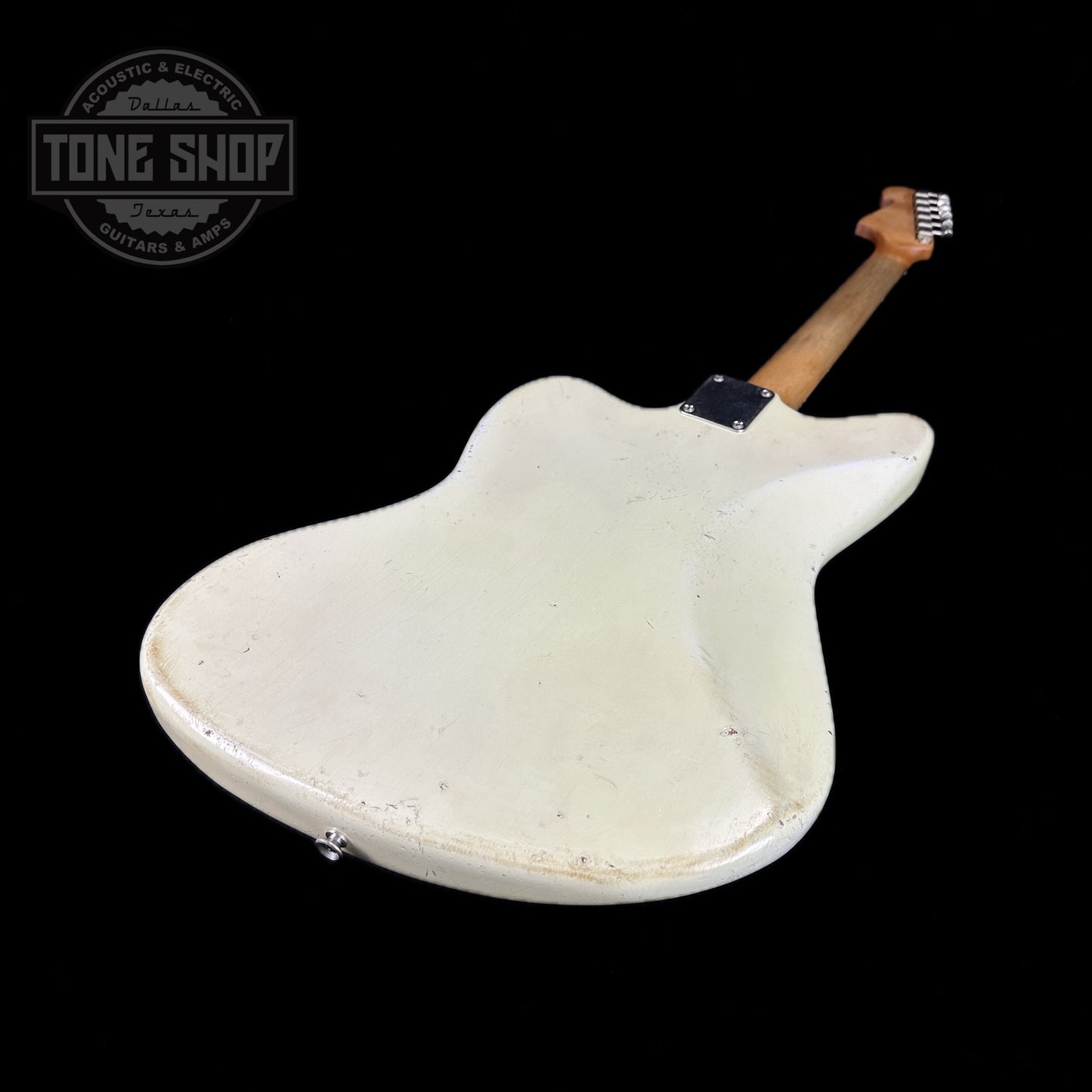 Back angle of Used Danocaster Offset Vintage White.