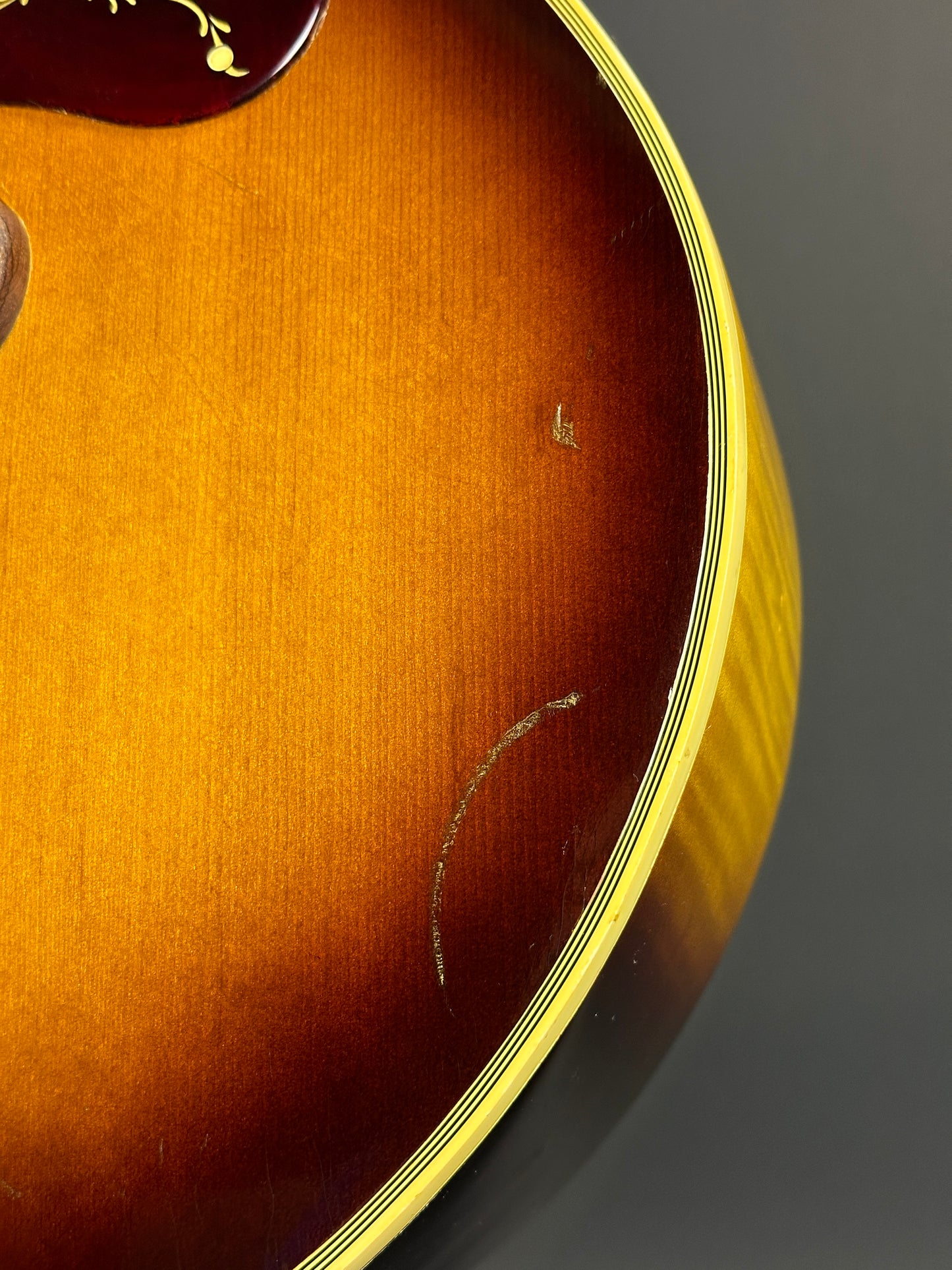 Marks on front of Vintage 1954 Gibson SJ-200 Sunburst.