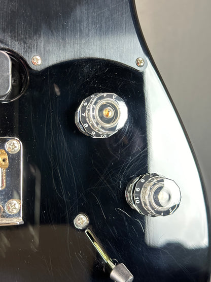 Scratches near controls of Used PRS NF53 Black.