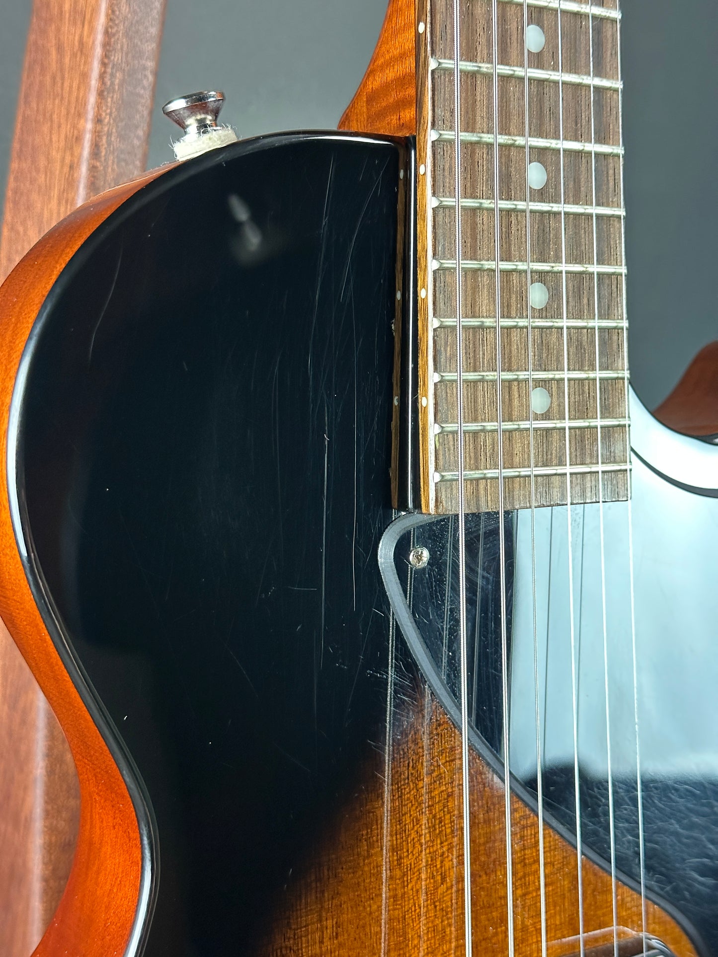 Scratches on front of Used Epiphone Les Paul Junior Burst.