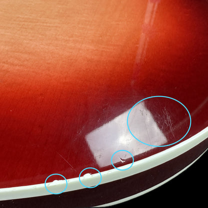 Damage on bottom edge of Used 1997 Rickenbacker 360V64 Fireglow.