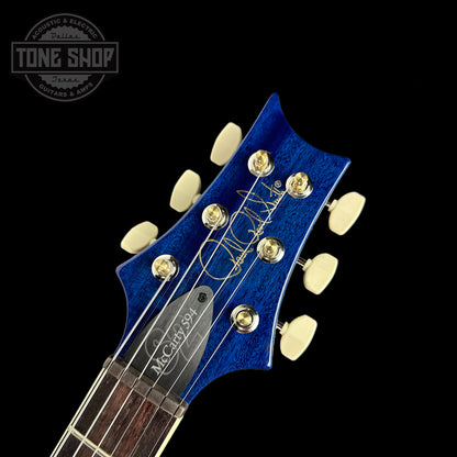 Front of headstock of PRS S2 McCarty 594 2024 Spec TSG Flame Top Lake Blue.