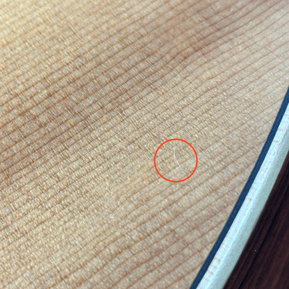 Scratch on body of Used Larivee L-03-12R.