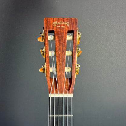 Front of headstock of Used Martin 000C Nylon.