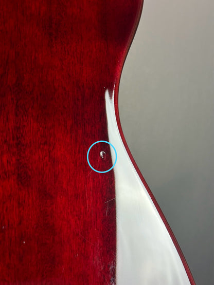 Ding on back of Used Gretsch G2220 Walnut Stain.