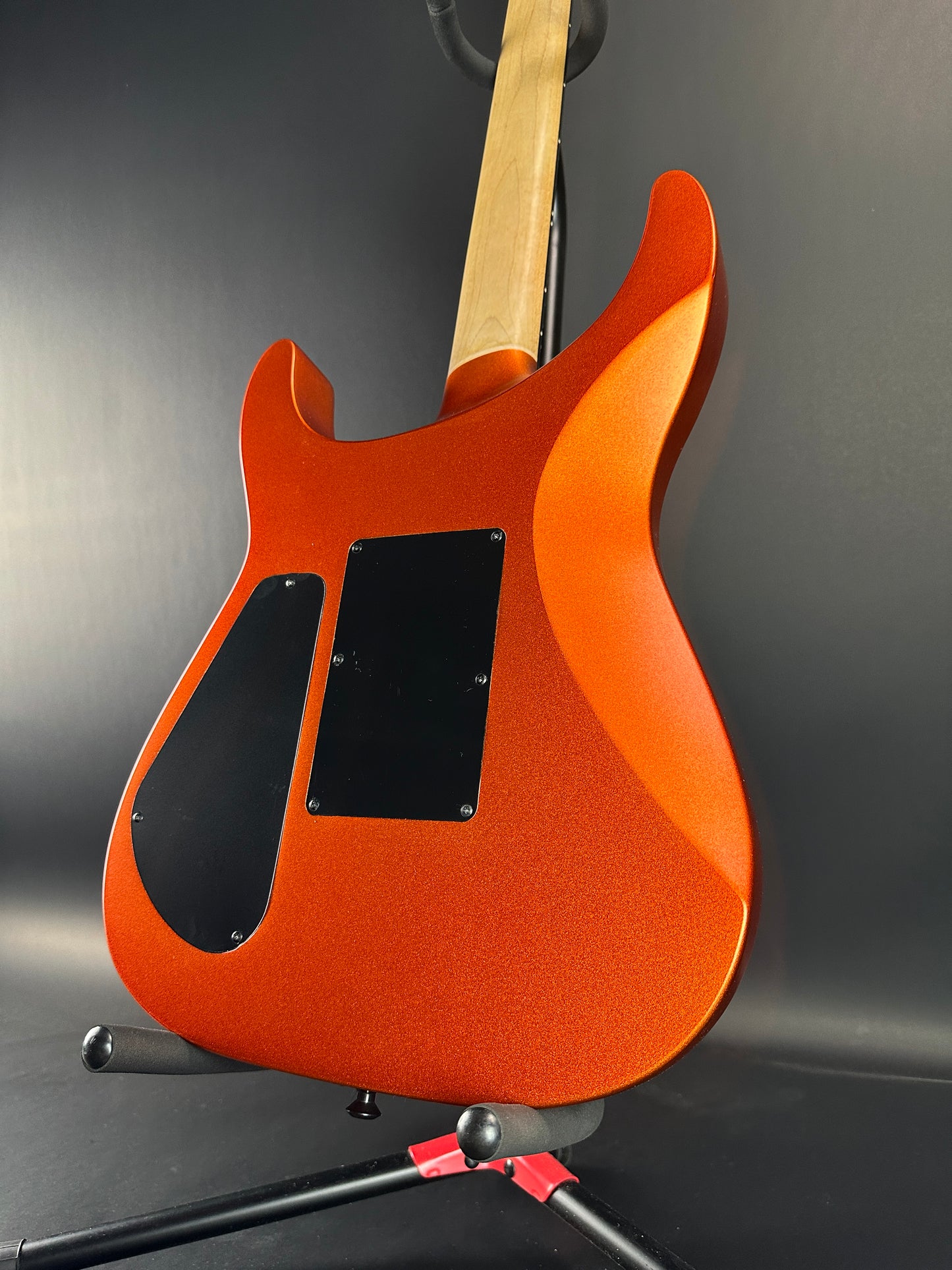 Back angle of Used Jackson Pro Series Soloist SL3 Satin Orange Blaze.