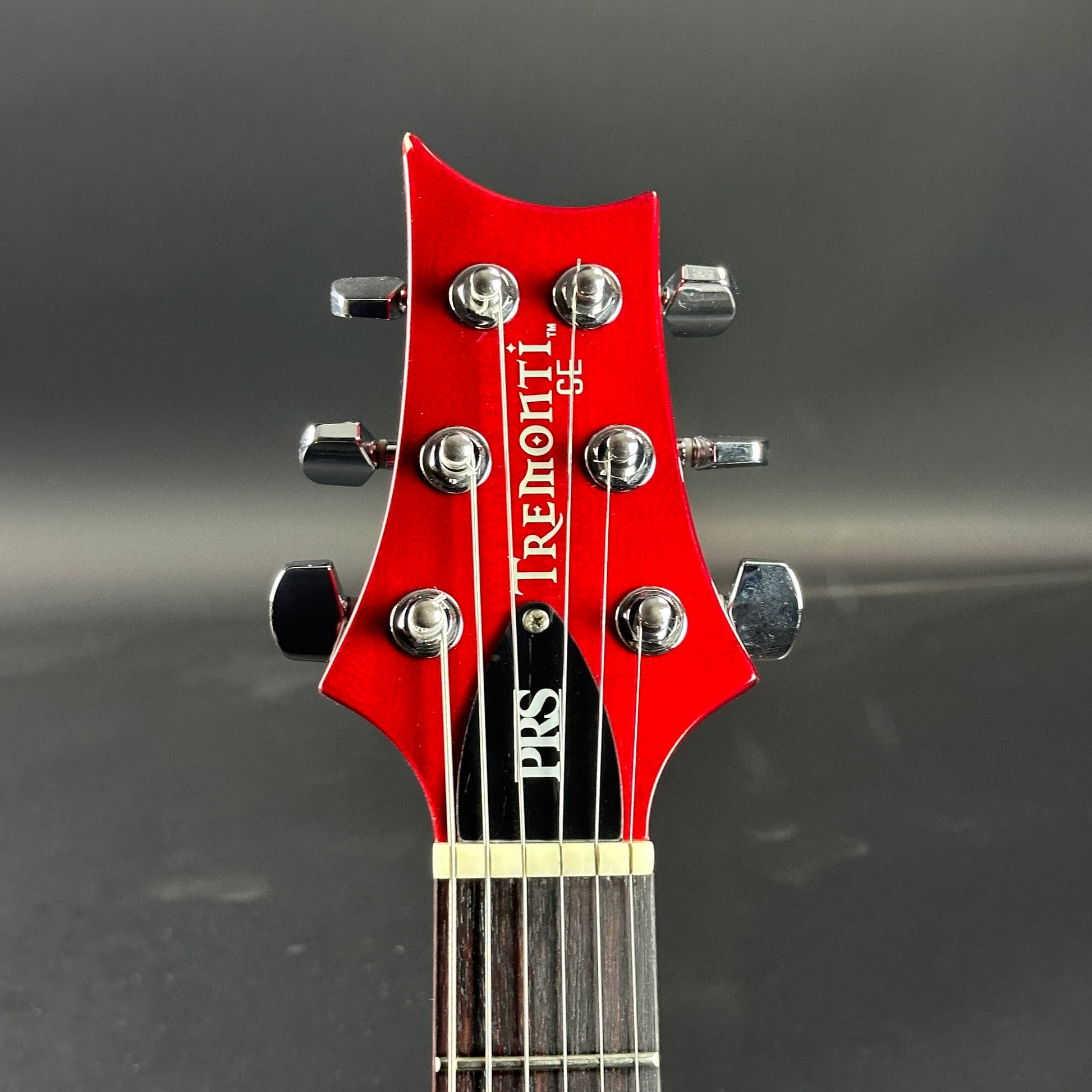 Front of headstock of Used PRS SE Mark Tremonti Cherryburst.