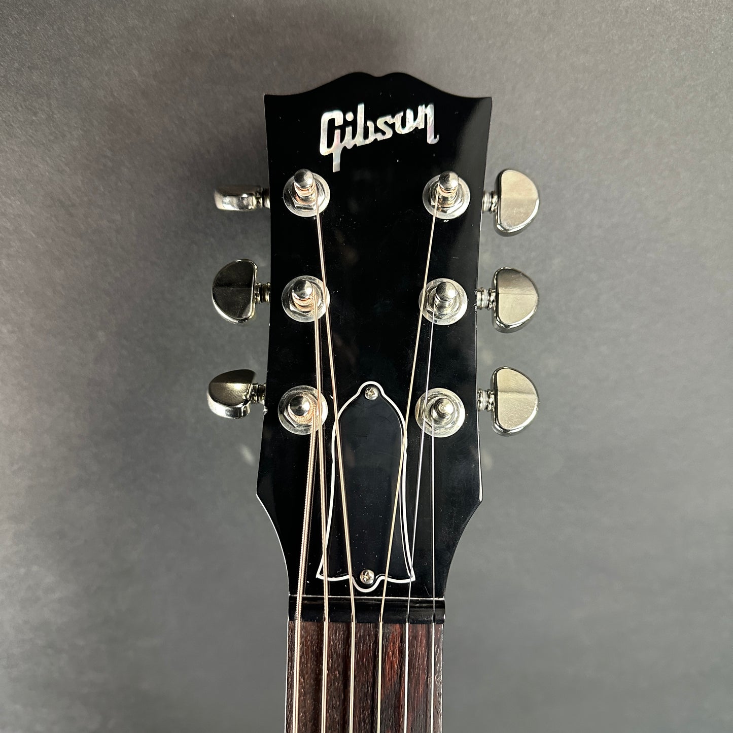 Front of headstock of Used Gibson Custom Shop M2M J-45 Long Scale Ebony.