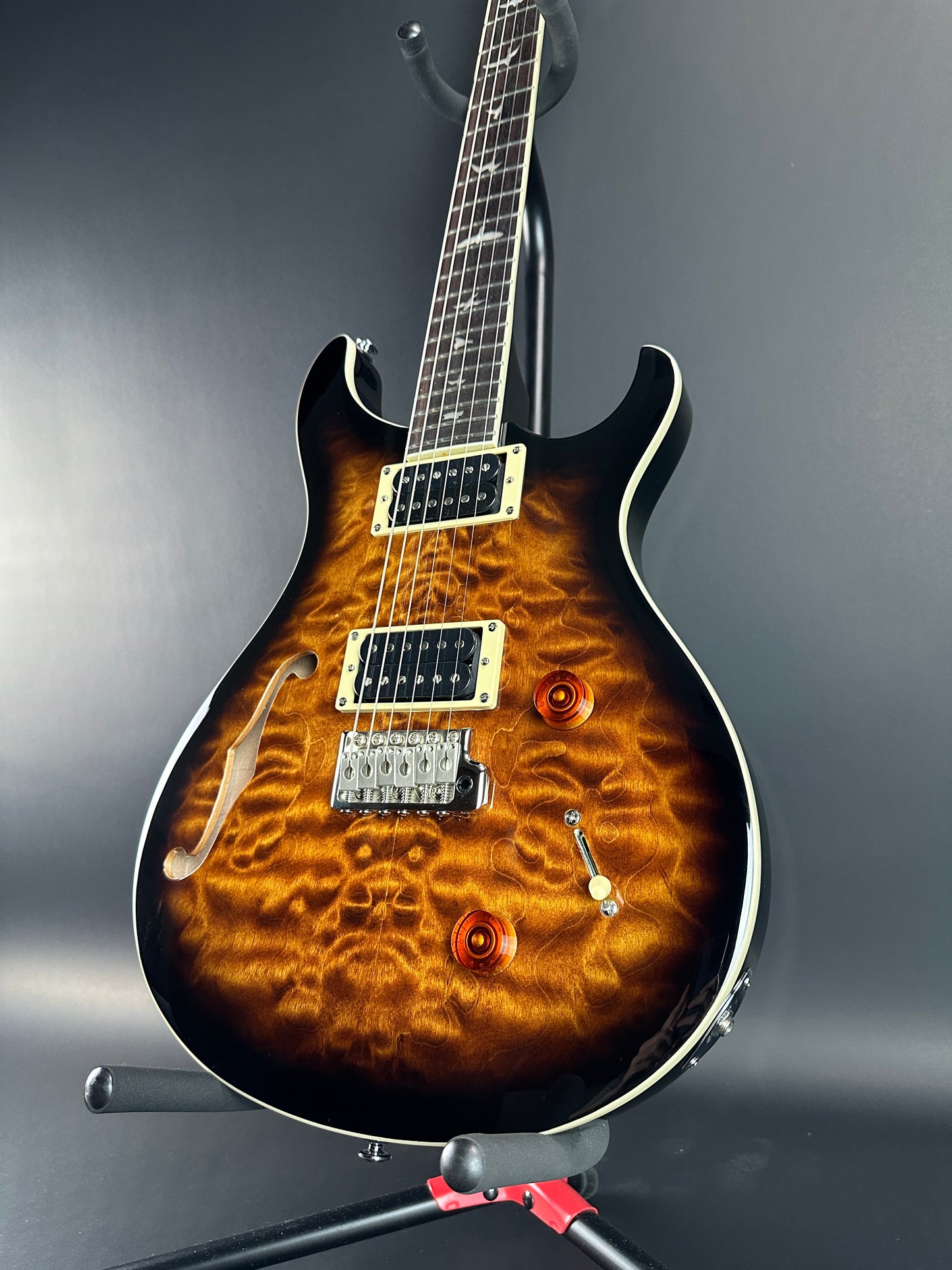 Front angle of Used PRS SE Custom 22 Semi-Hollow Black Gold Burst.