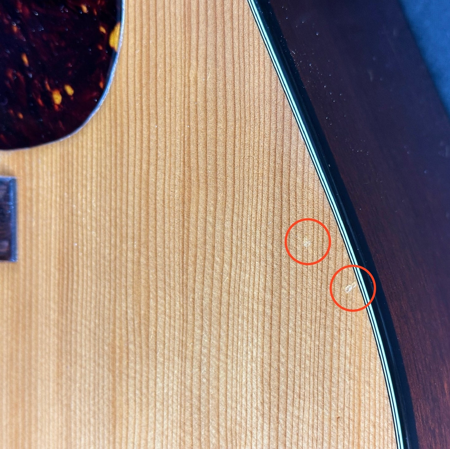 Two dings on side of Vintage 1967 Martin D18.