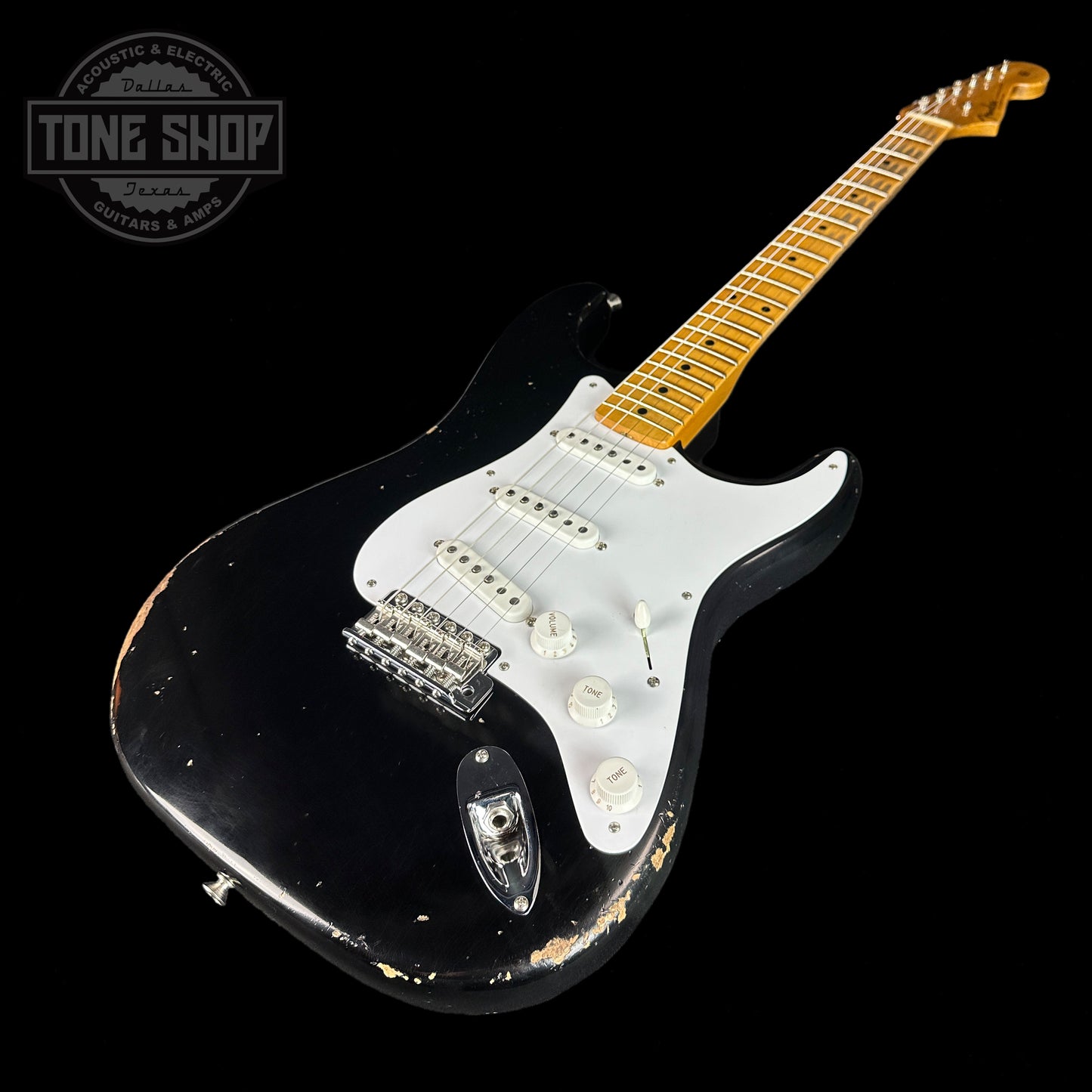 Front angle of Fender Custom Shop Limited Edition Fat '54 Strat Relic With Closet Classic Hardware Aged Black.