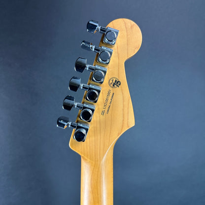 Back of headstock of Used Fender American Ultra Stratocaster Left Hand Cobra Blue.