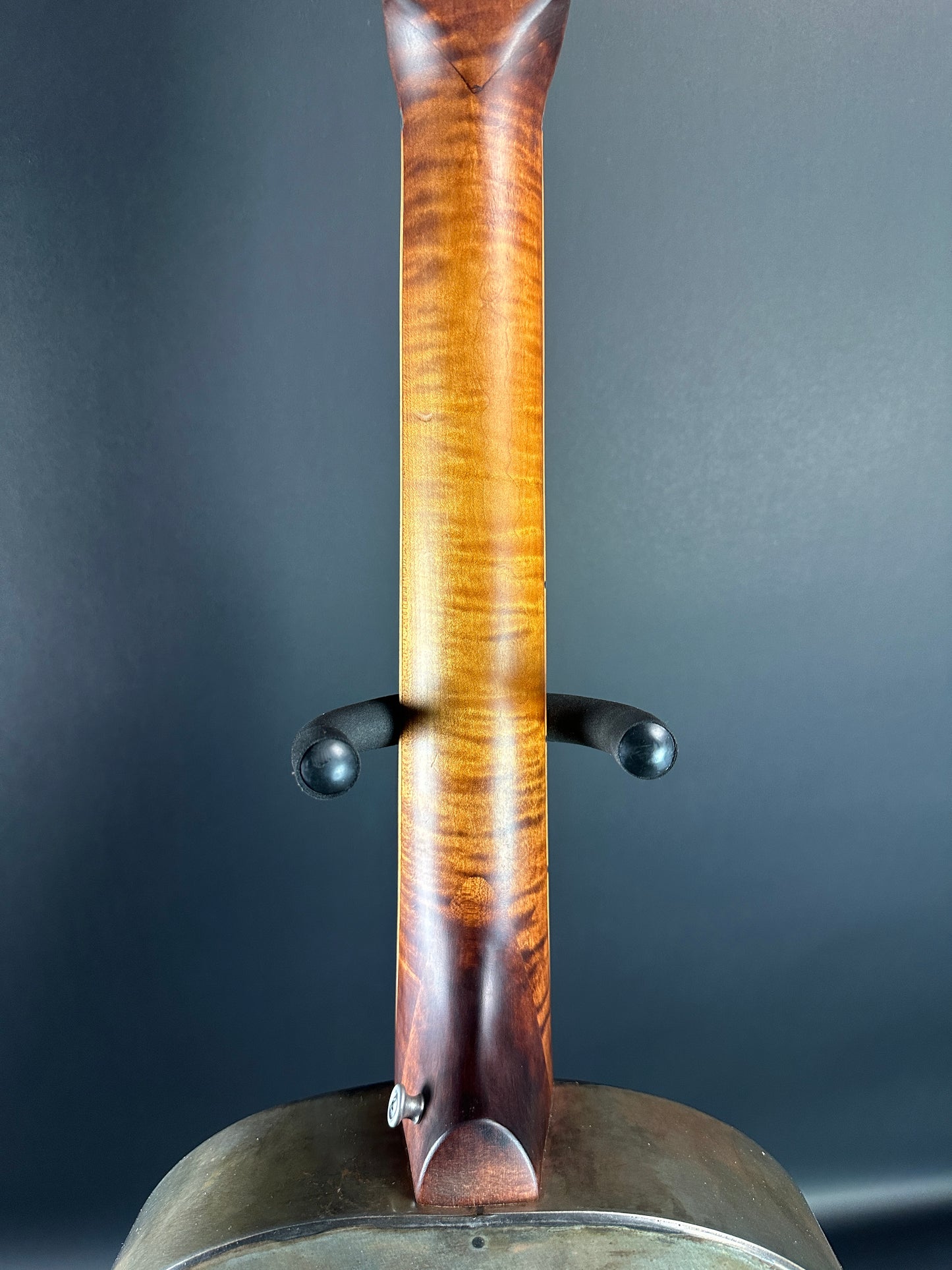 Back of neck of Used Mule Resonator Guitar.