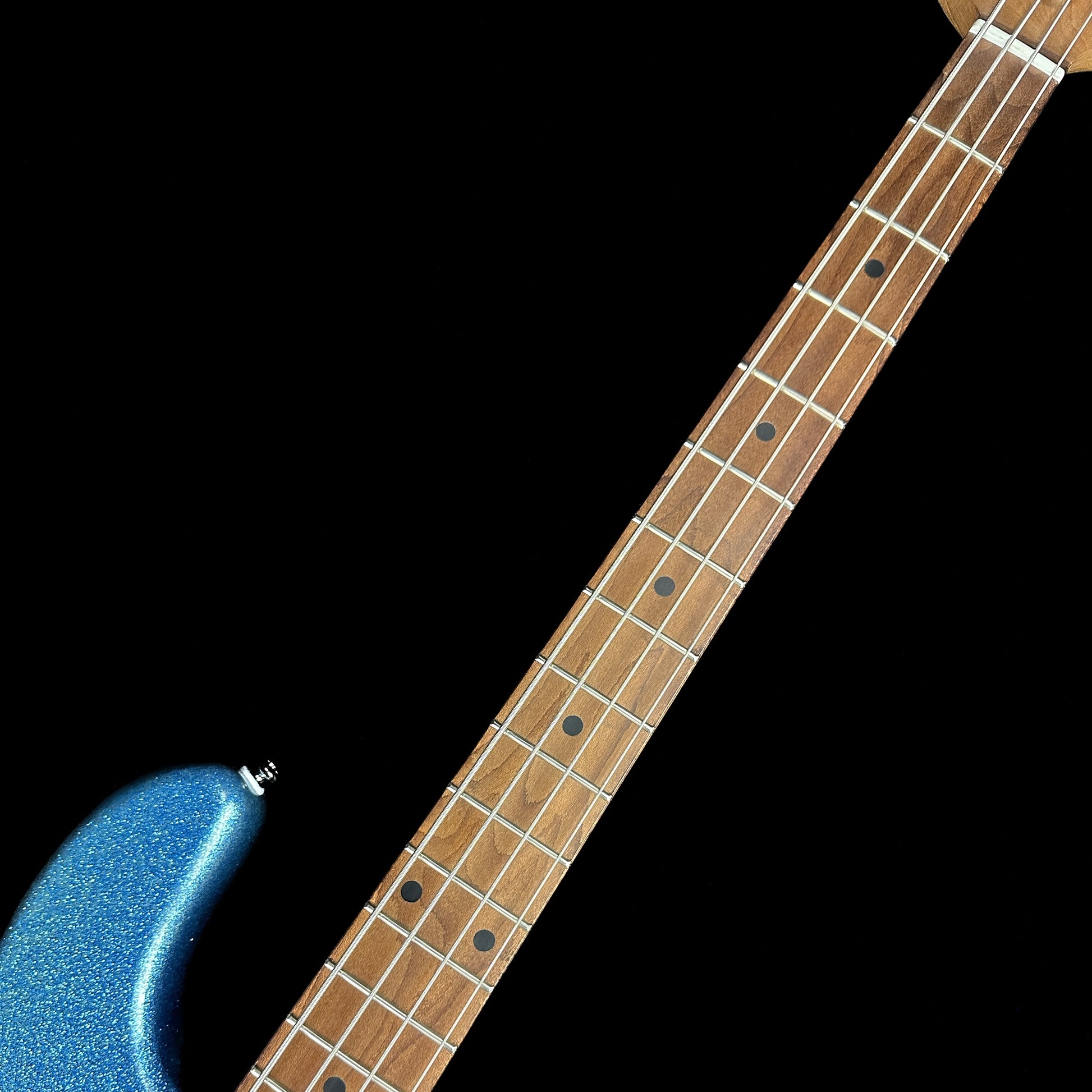 Fretboard of Used Sterling Ray 34 Bass Blue Sparkle.