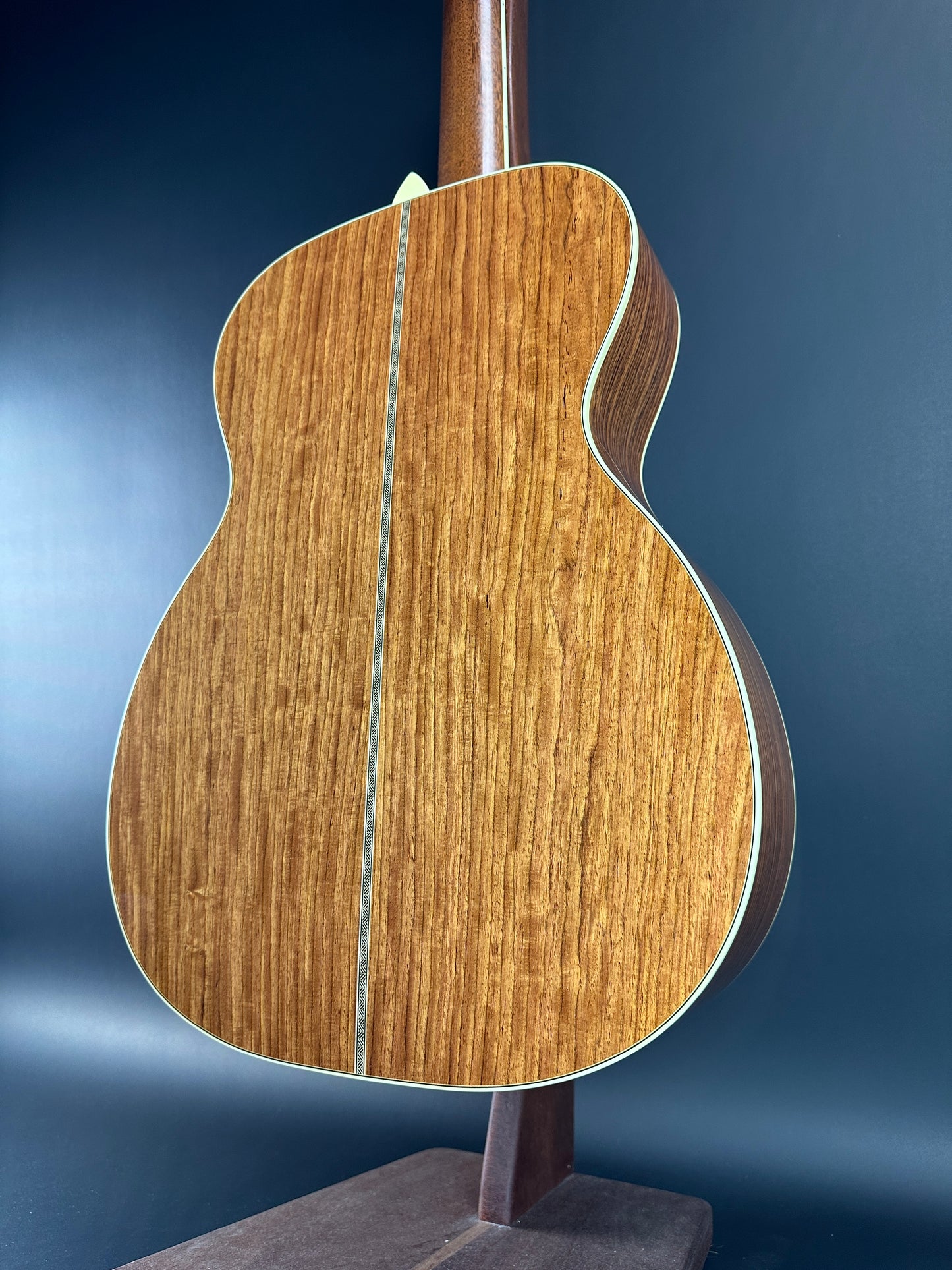 Back angle of Used Bourgeois Panama Red OM Large Soundhole Aged Adirondack.