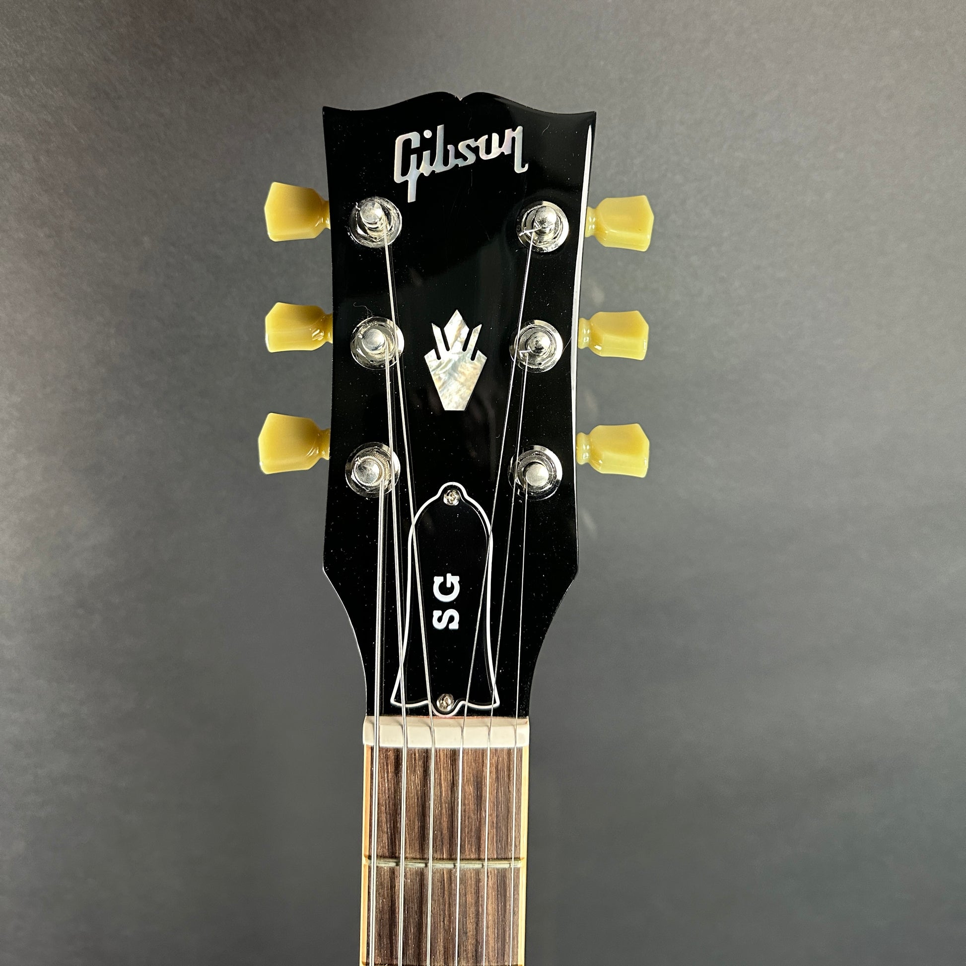 Front of headstock of Used 2019 Gibson '61 Reissue SG Cherry.