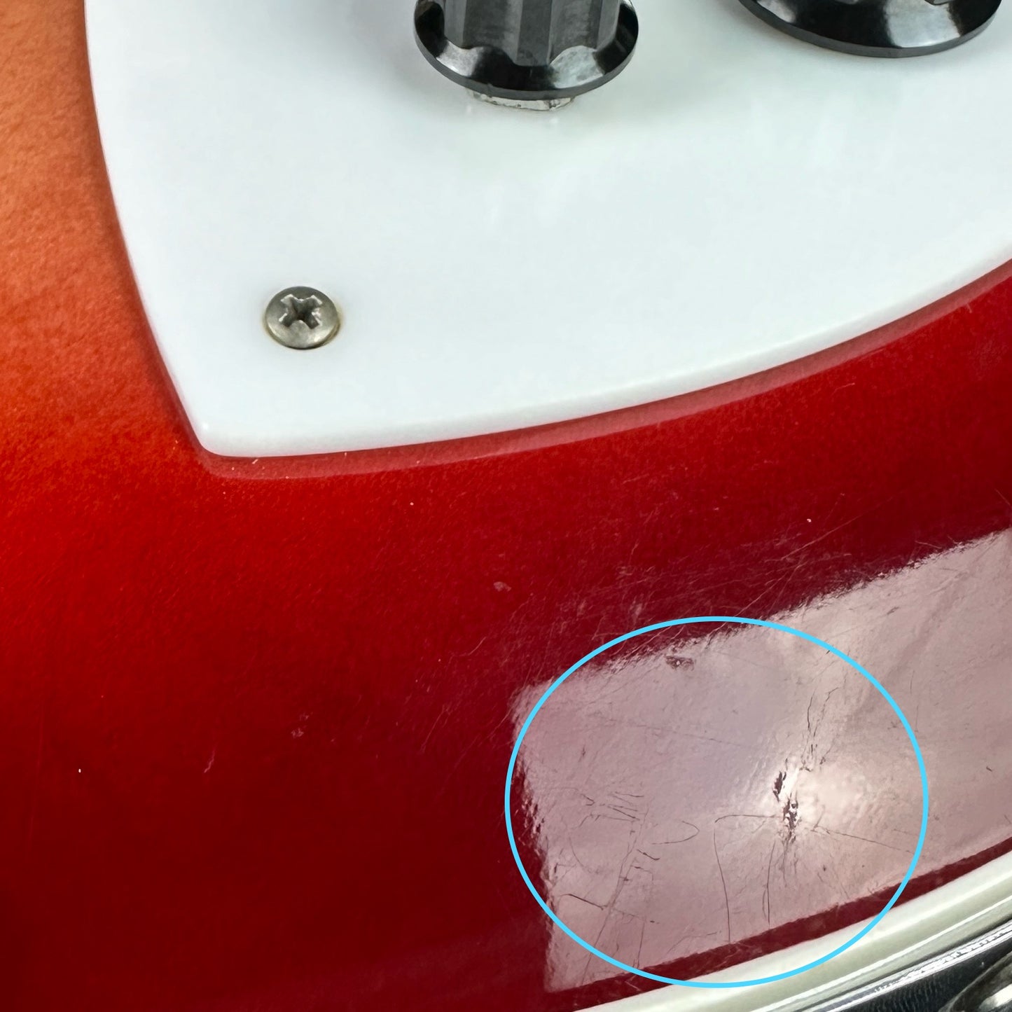 Scratches near output jack of Used 1997 Rickenbacker 360V64 Fireglow.