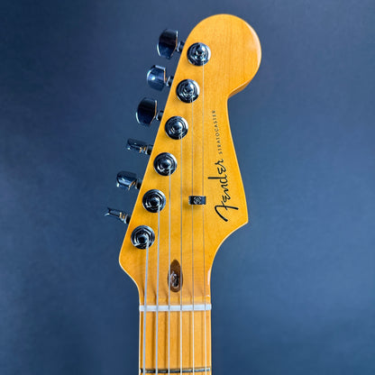 Front of headstock of Used 2022 Fender American Ultra Strat Ultraburst.