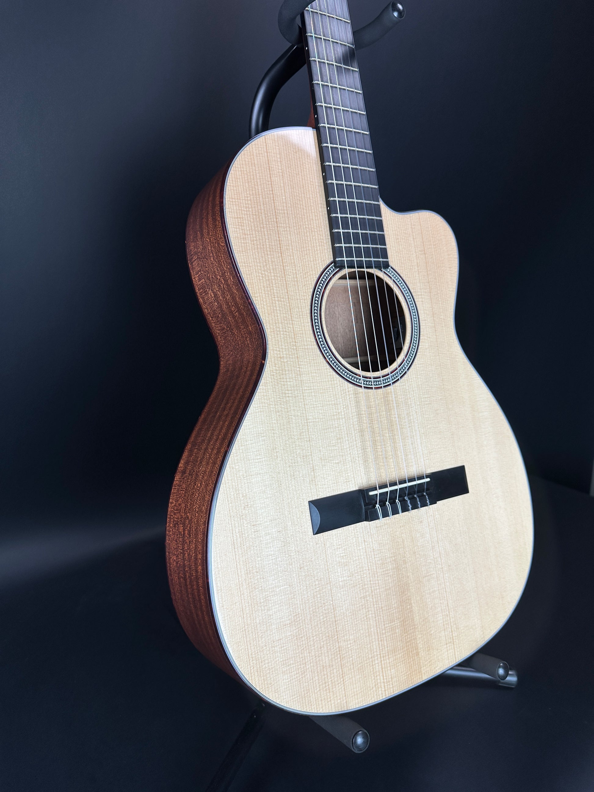 Front angle of Used Martin 000C Nylon.