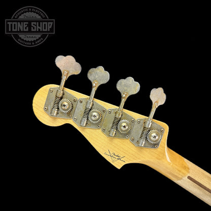 Back of headstock of Fender Custom Shop Time Machine '58 Precision Bass Relic Super Faded Aged Chocolate 3 Color Sunburst.