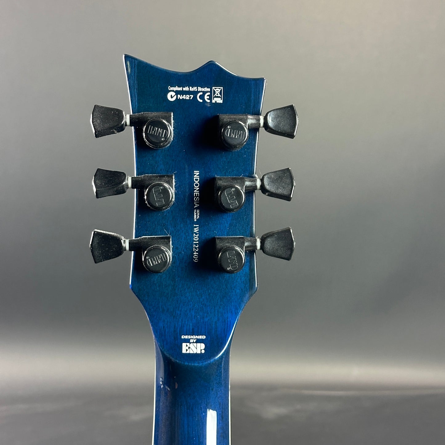 Back of headstock of Used ESP LTD EC-1000 Deluxe Blue Nat Fade.