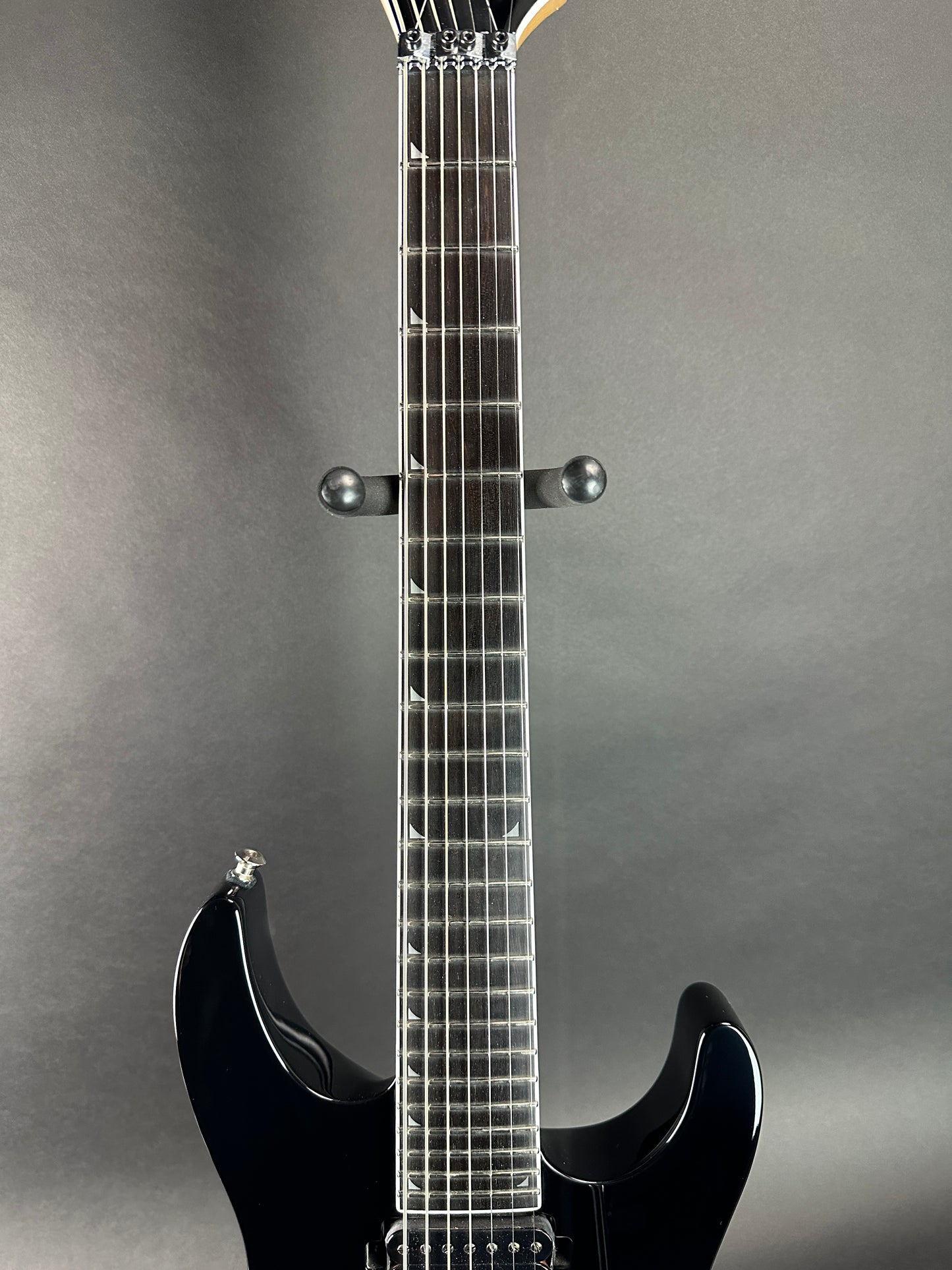 Fretboard of Used Jackson Pro Series SL7 Ebony Fretboard Gloss Black.