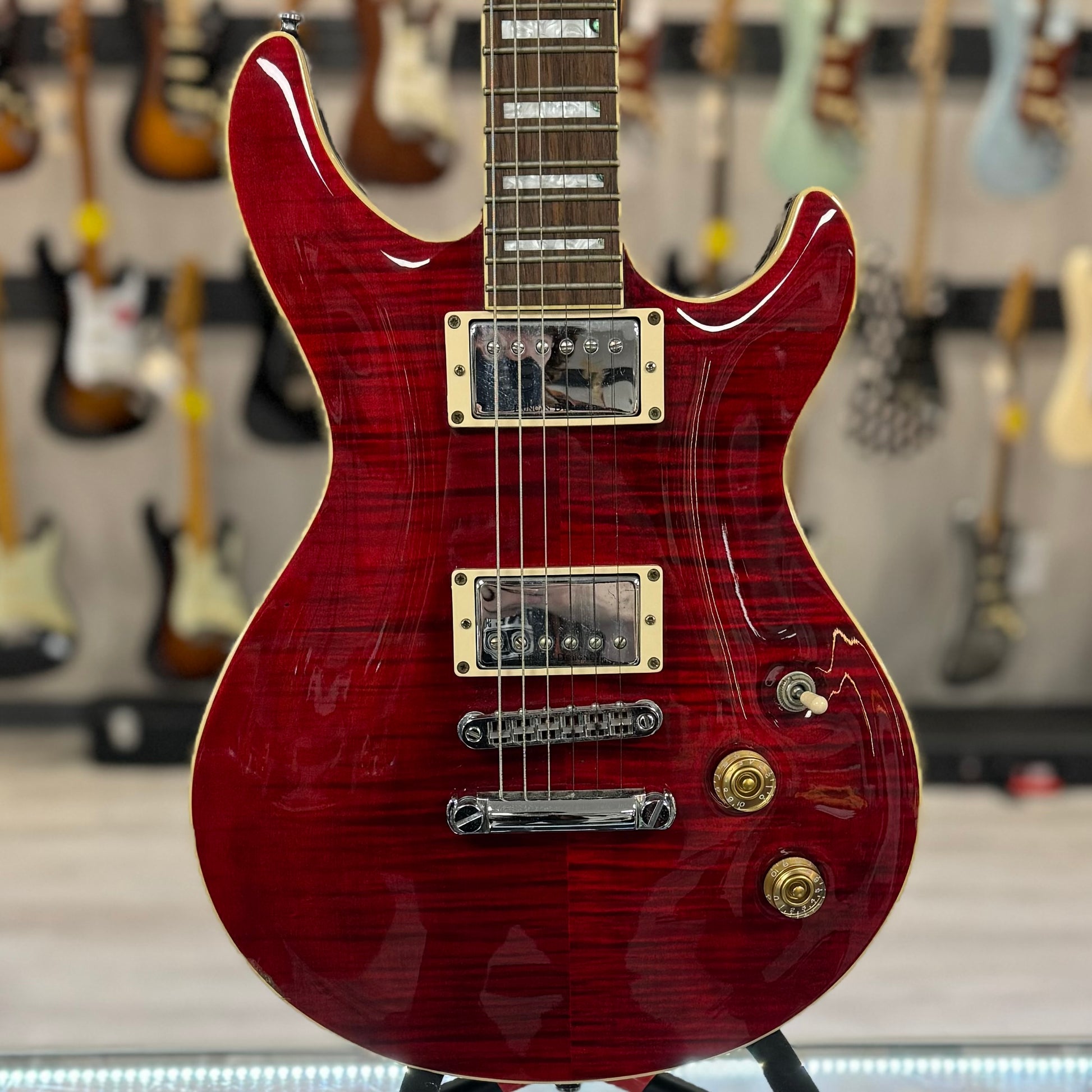 Front of Used Cort M600 Flame Top Cherry w/case