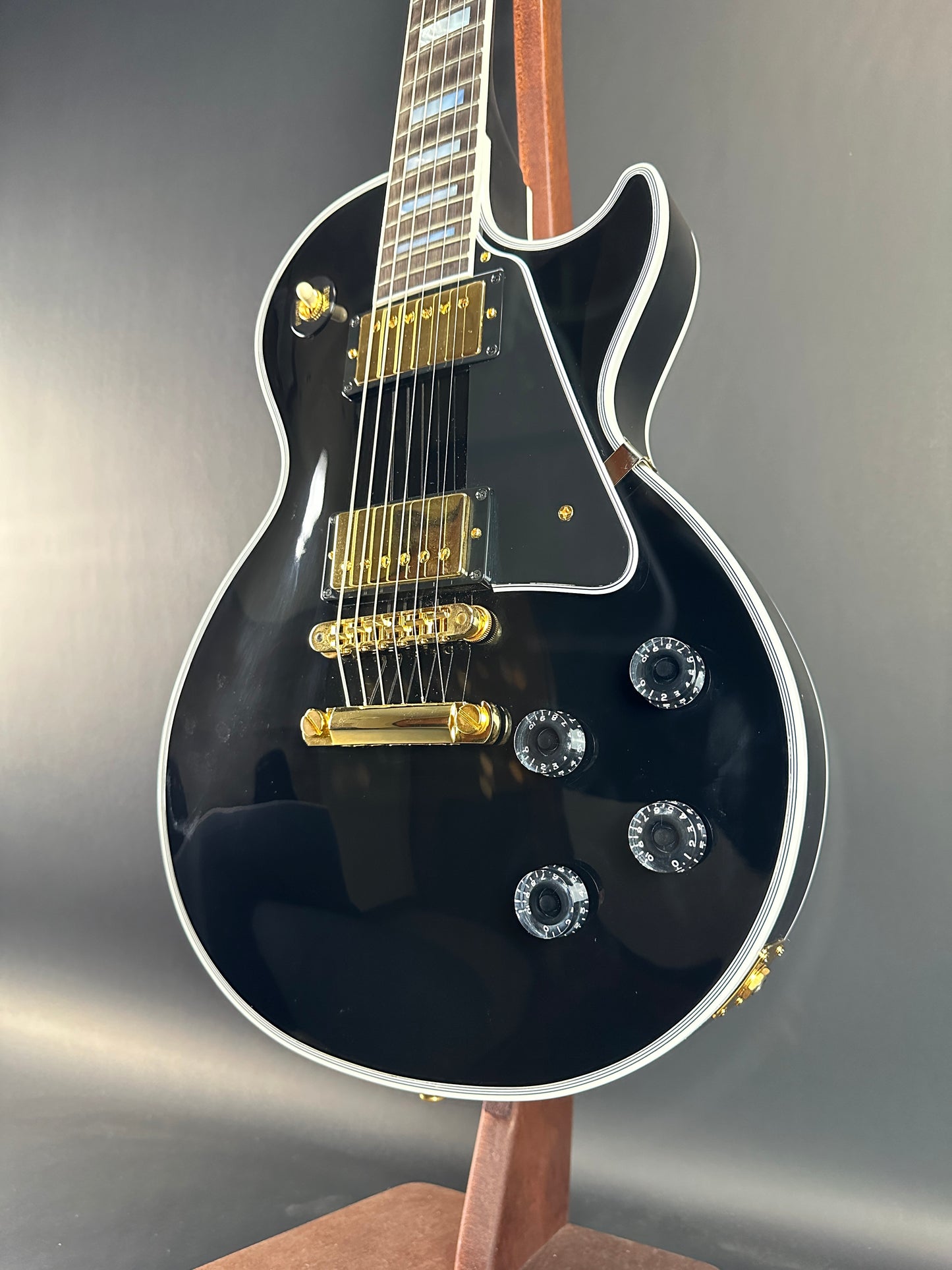 Front angle of Used Gibson Custom Shop Les Paul Custom Ebony.