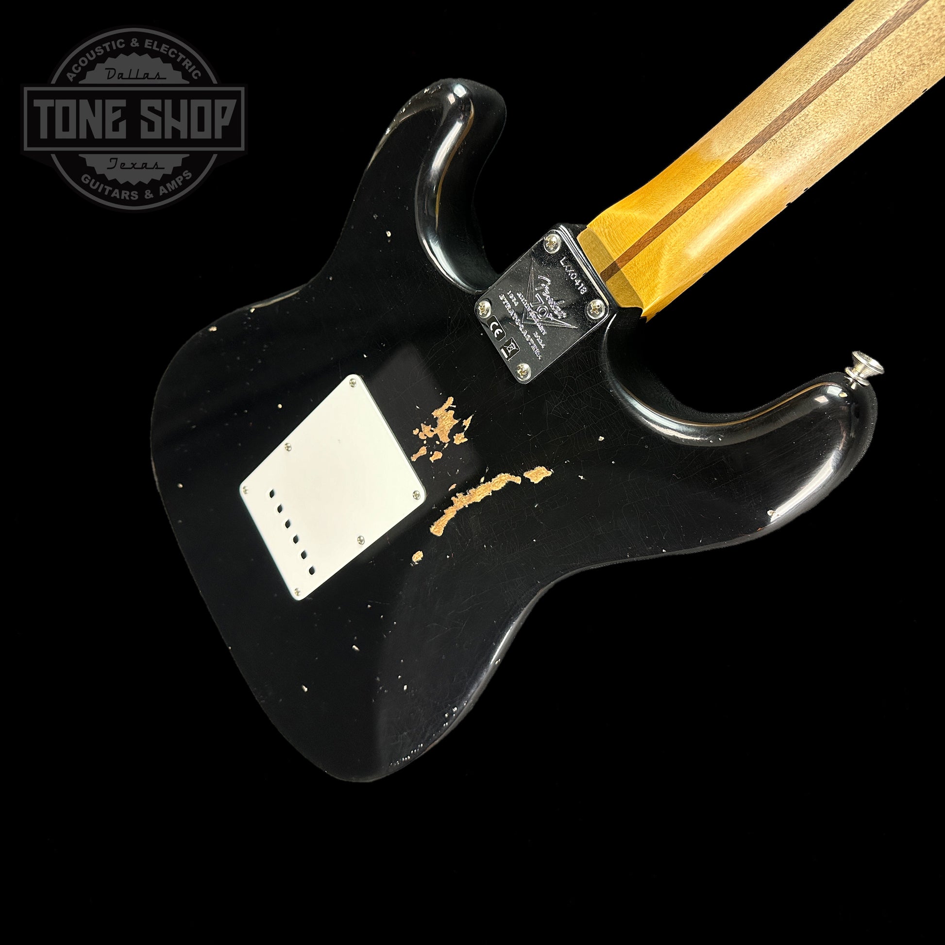 Back angle of Fender Custom Shop Limited Edition Fat '54 Strat Relic With Closet Classic Hardware Aged Black.