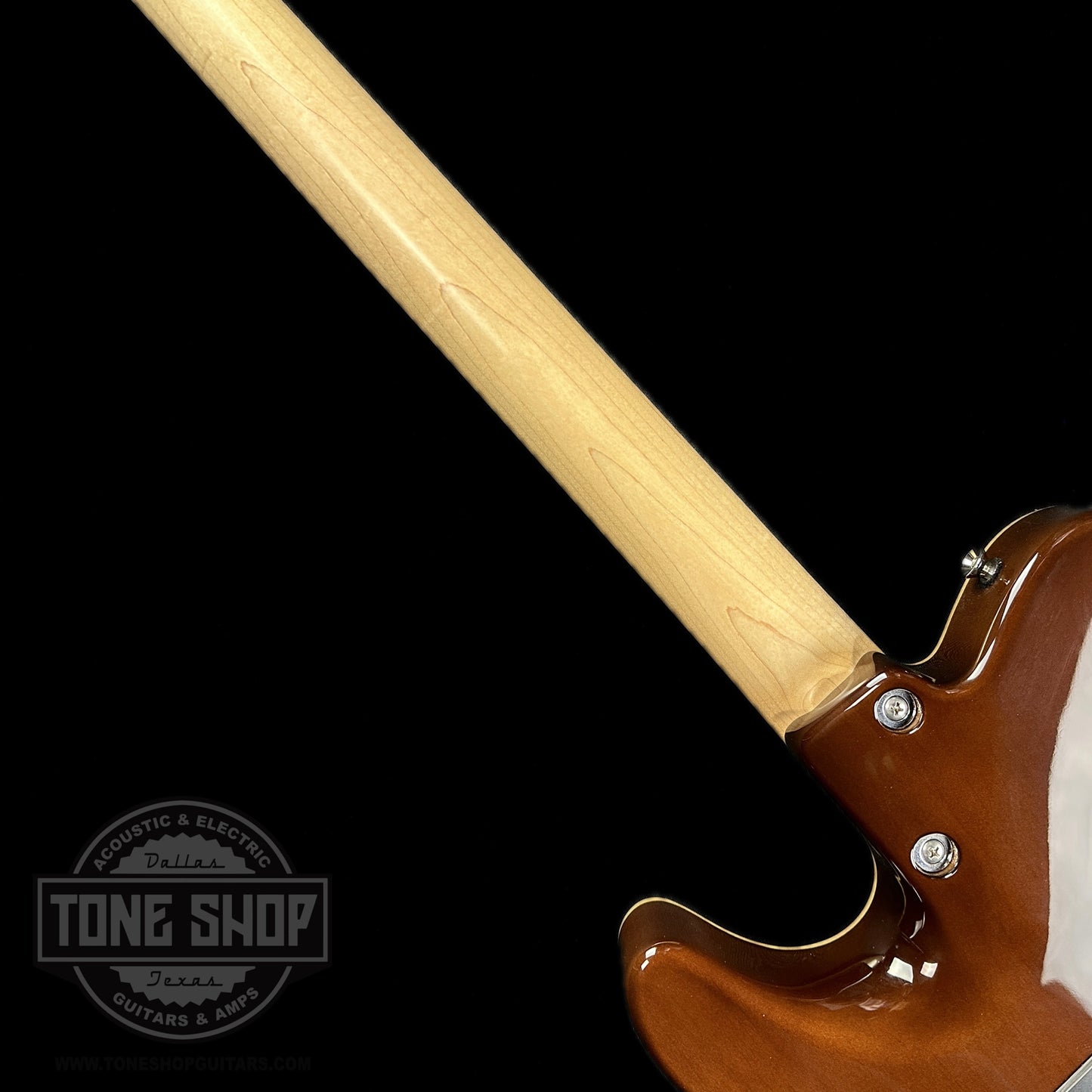 Back of neck of Used Tom Anderson Hollow T Drop Top Tiger Eye.