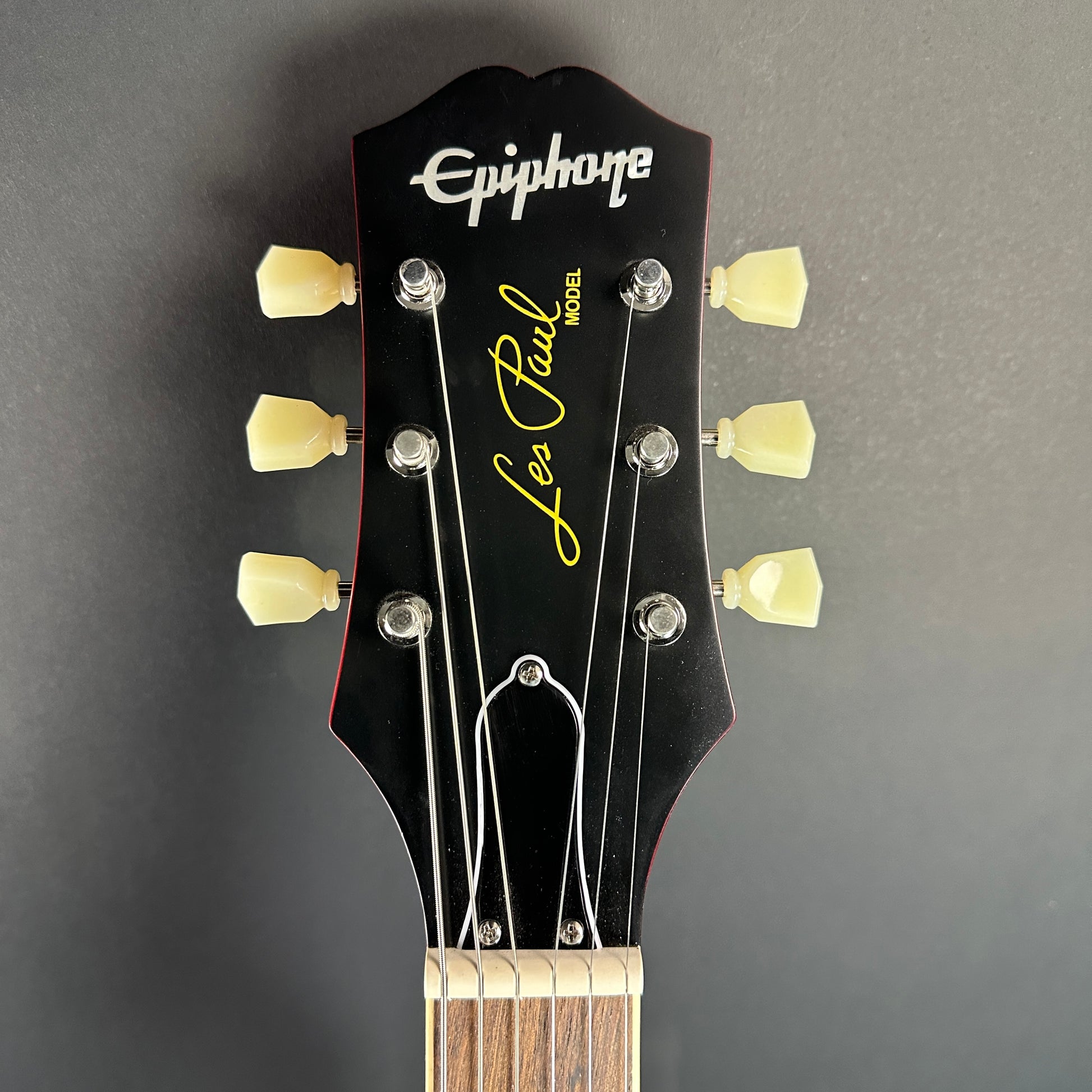 Front of headstock of Used Epiphone '59 Les Paul Lemonburst.