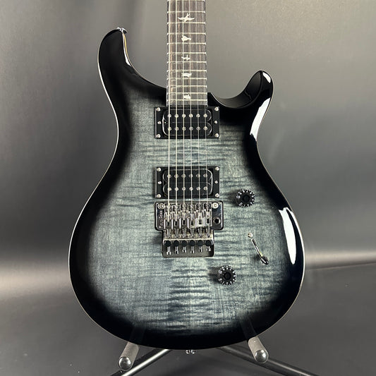 Front of Used PRS SE Custom 24 Floyd Rose Charcoal Burst.