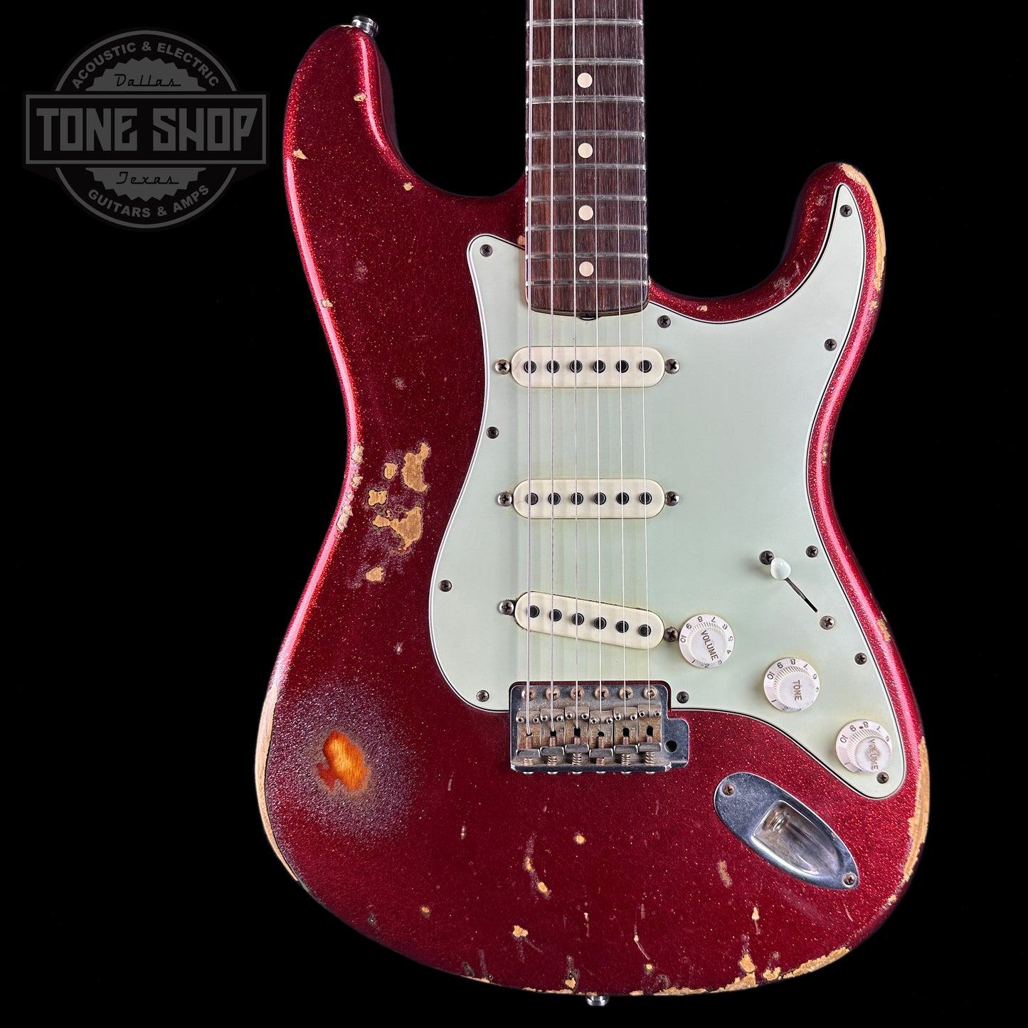 Front of Used Fender Custom Shop Jason Smith Masterbuilt Strat 60s Relic Red Sparkle.