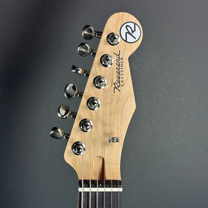 Front of headstock of Used Reverend PA2S Pete Anderson Eastsider S Gloss Root Beer Sparkle RW.