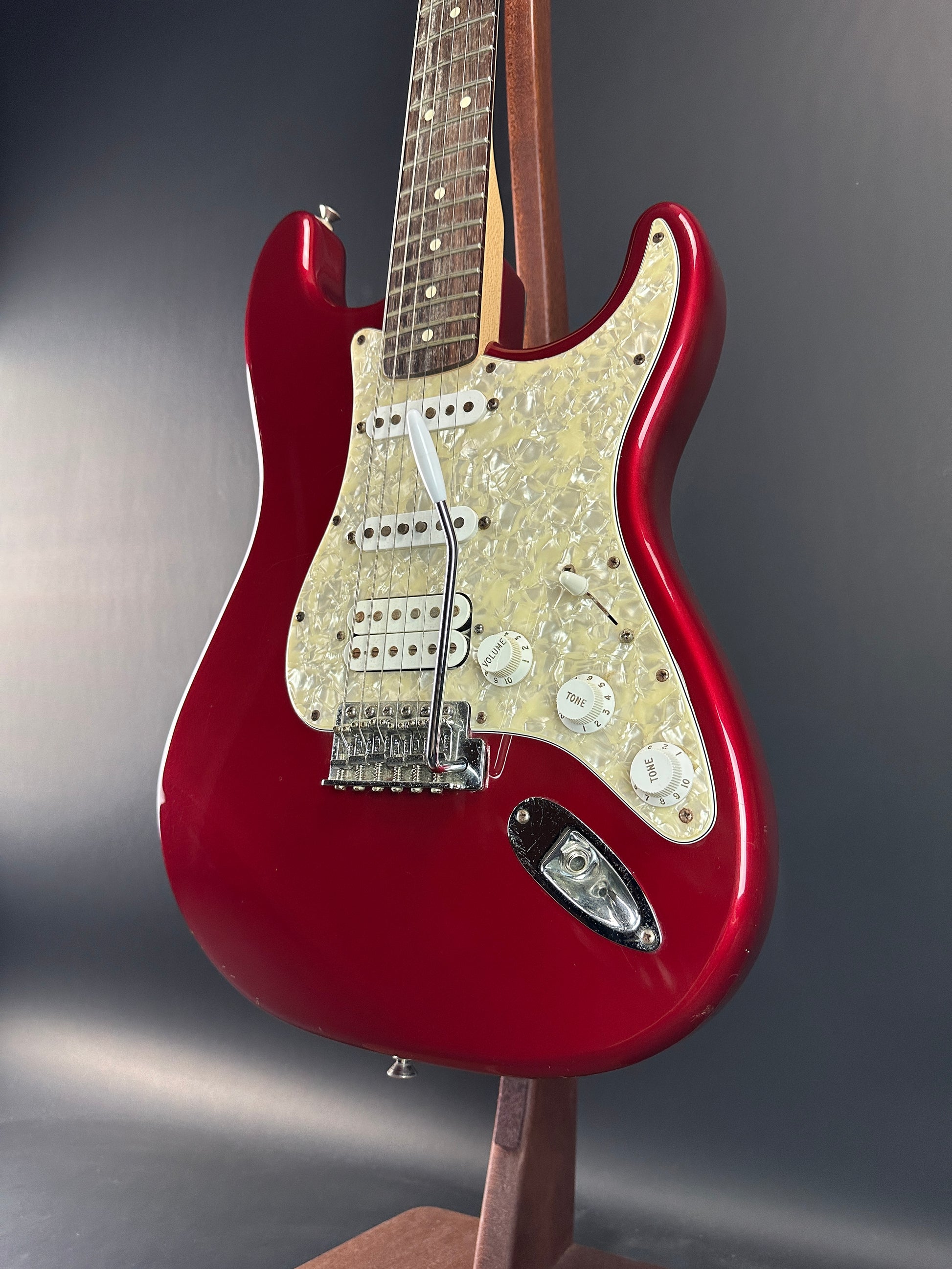 Front angle of Used 2006 Fender Sam Ash 48th Street Red Strat.