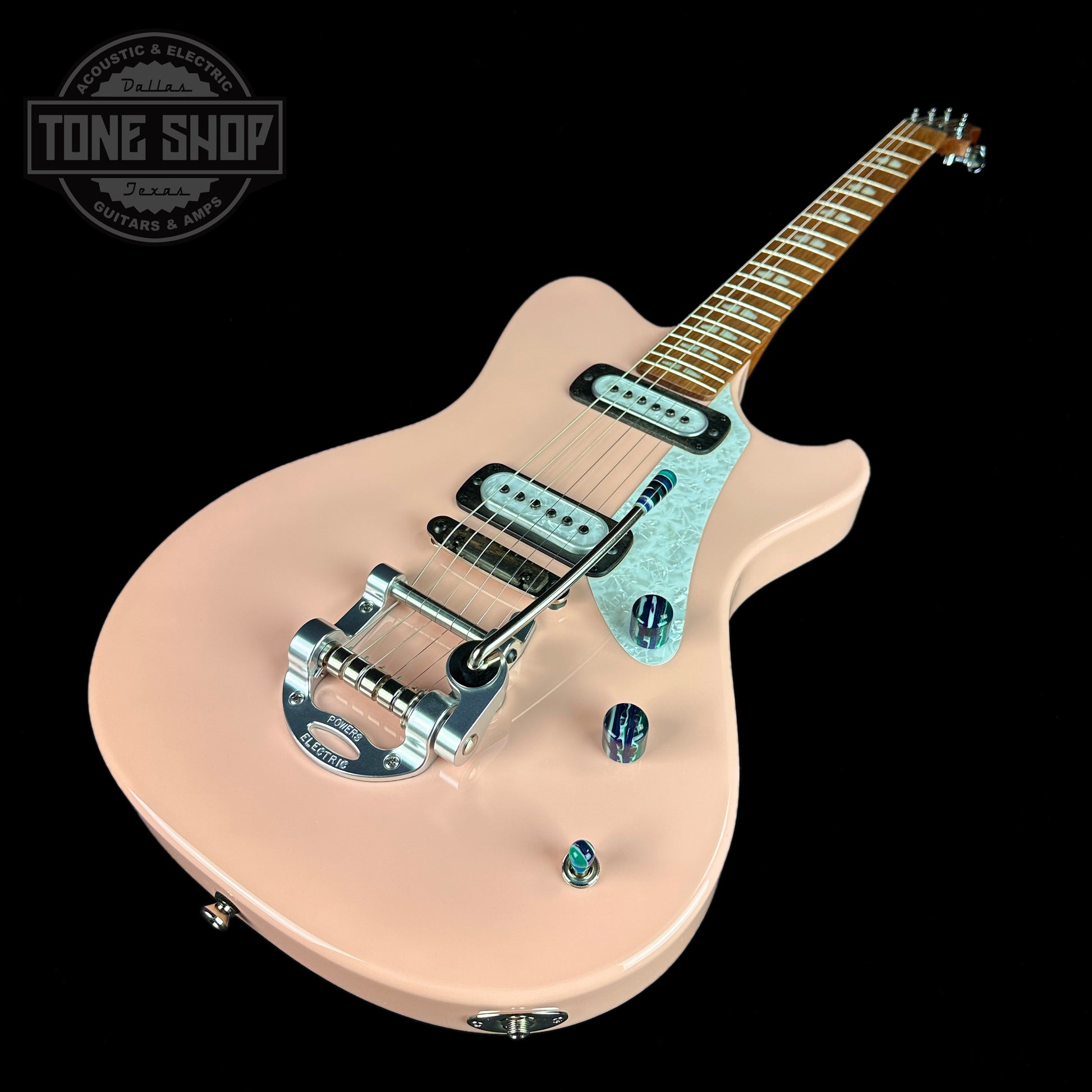 Front angle of Powers Electric A-Type Cochon PInk PF42 Pearl Ebony Cool CamTail.