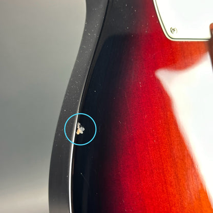 Ding on side of Used Fender American Performer Telecaster 3-Color Sunburst.