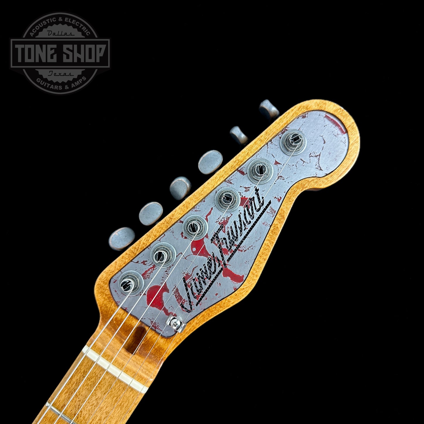 Front of headstock of Used Trussart Steelcaster Deluxe Cream.